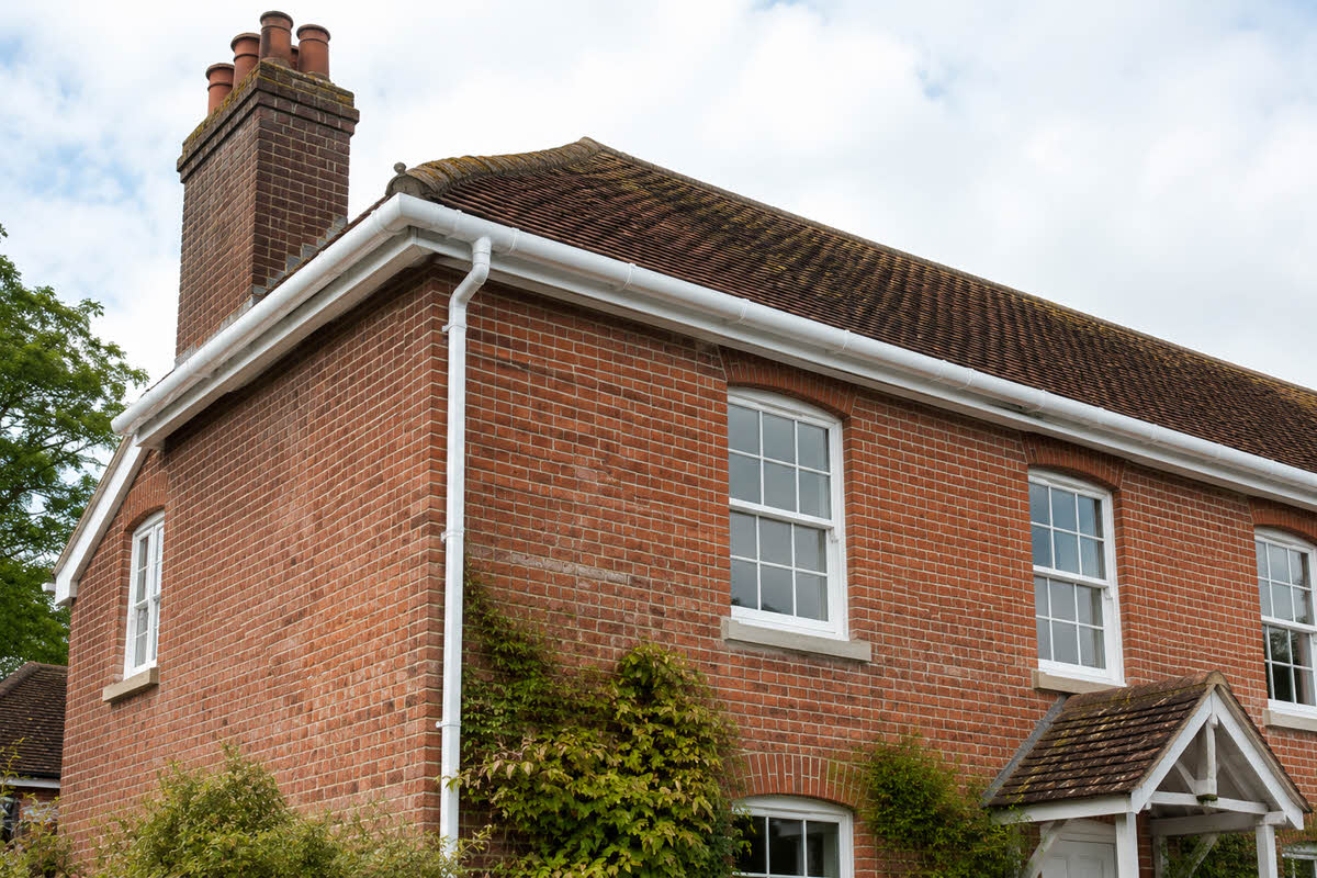 quirky older country home with new guttering in place